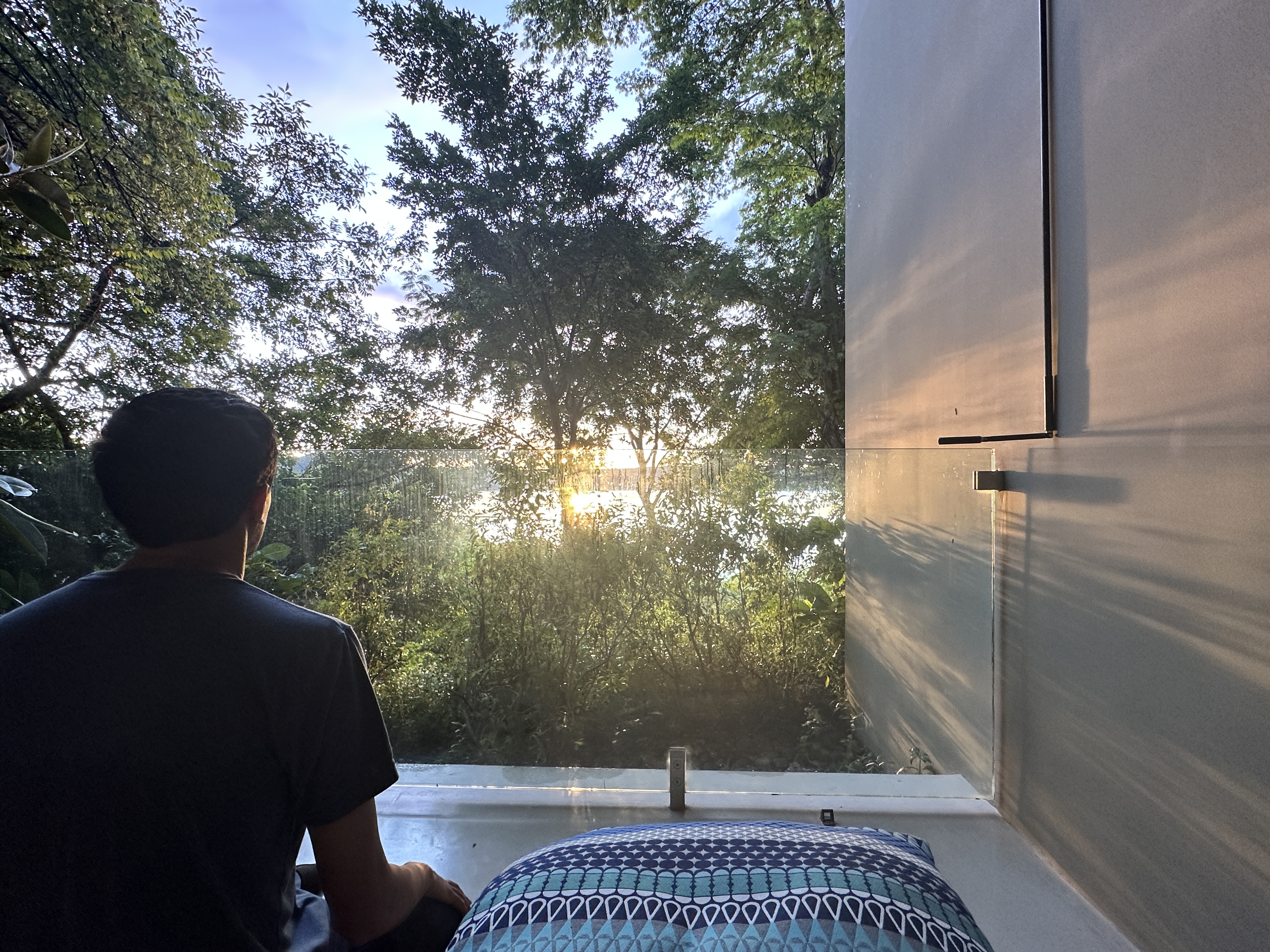 Watching sunset from a private terrace through the jungle canopy at Andaz Papagayo