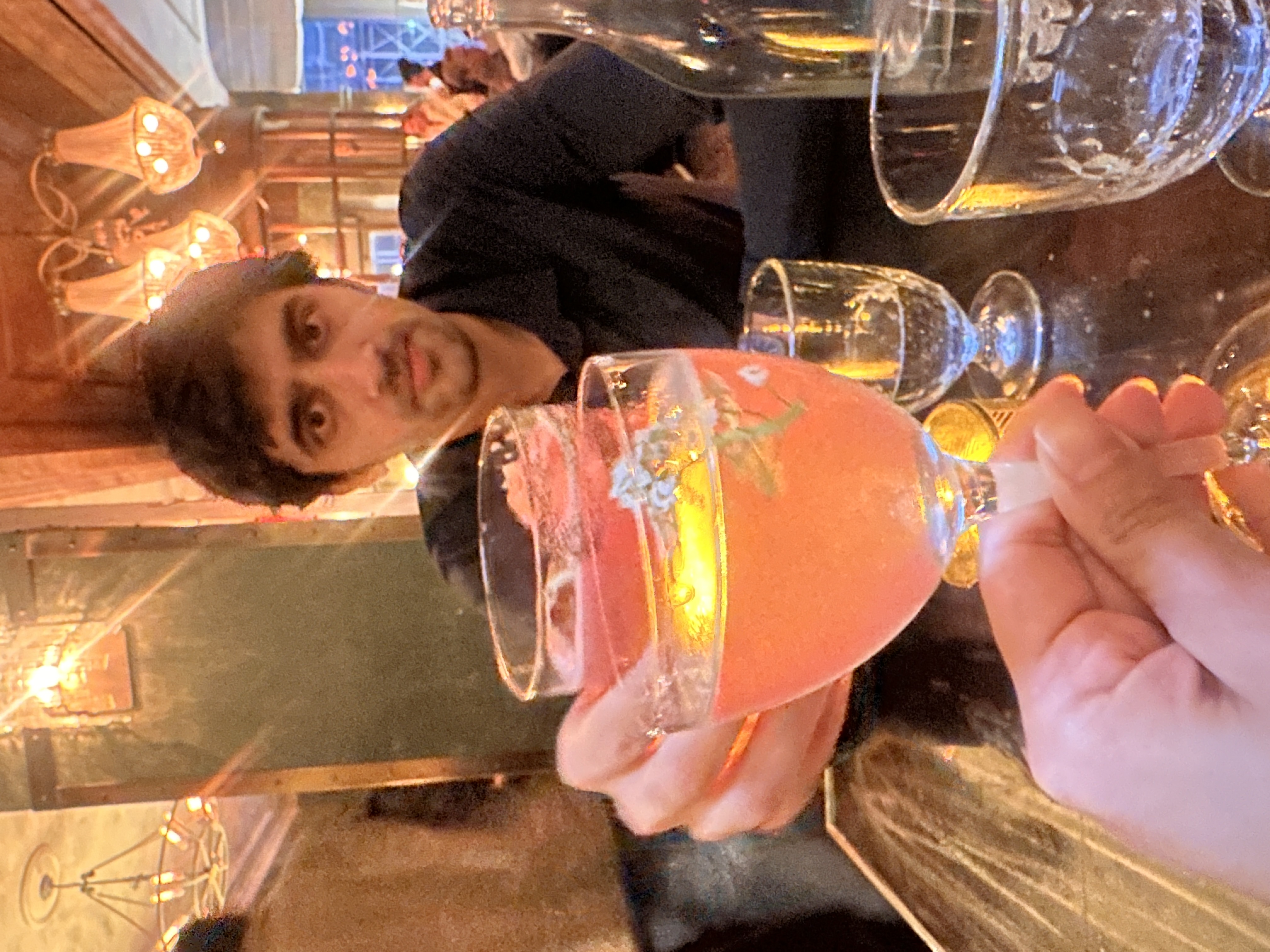 Pink floral cocktail at The Beekman's vintage bar